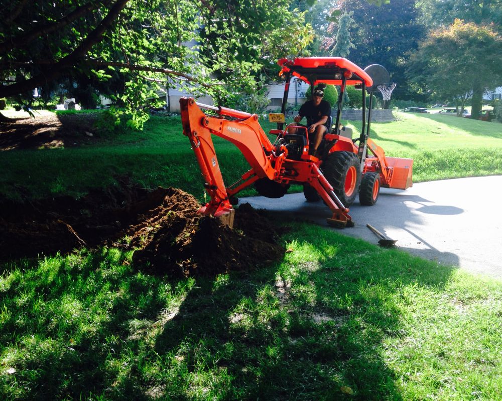Removing Soil for Driveway Extension