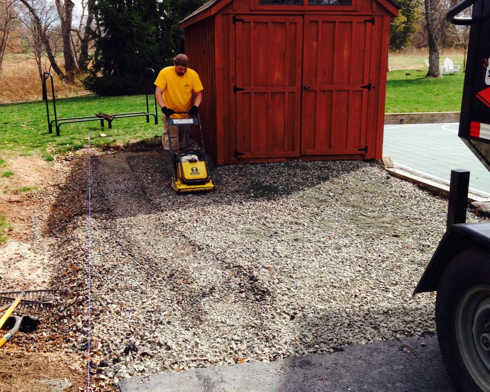 Compacting Stone for Asphalt Installation