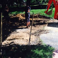Flattening Soil for Driveway Extension