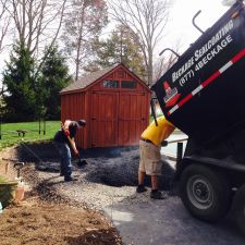 Pouring Asphalt for Driveway Expansion
