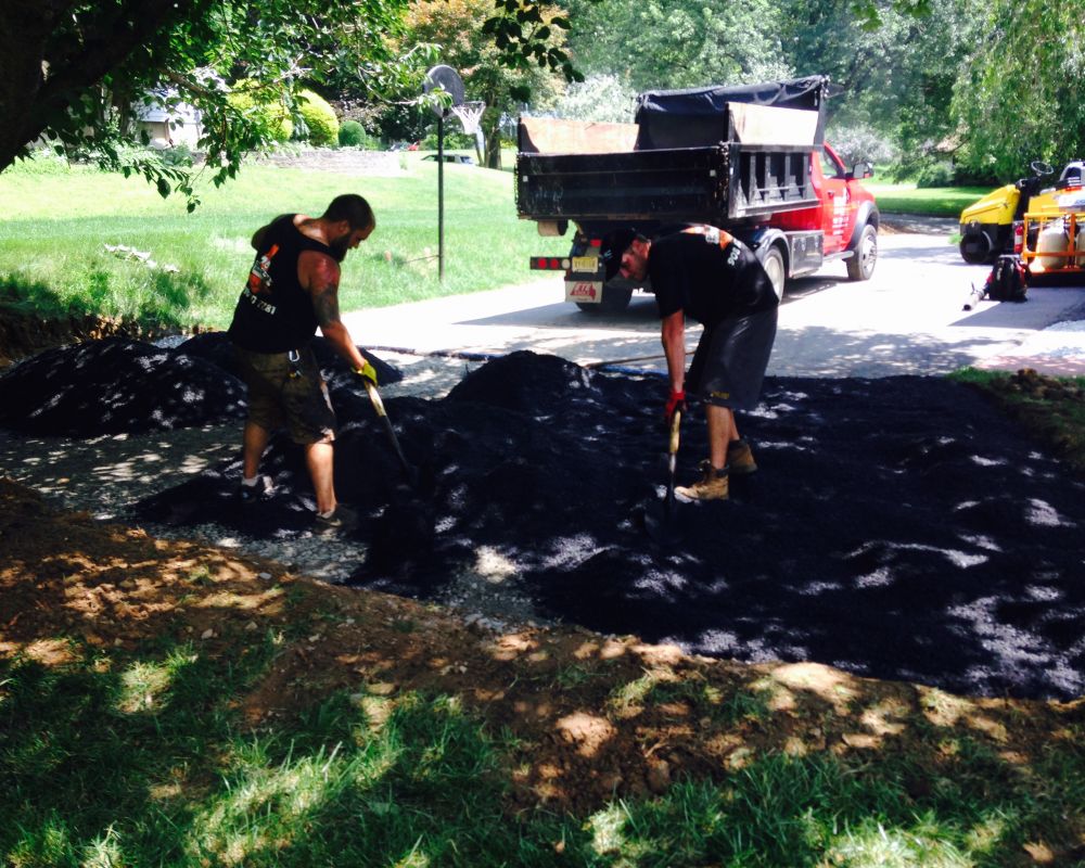 Laying Asphalt for Driveway Extension