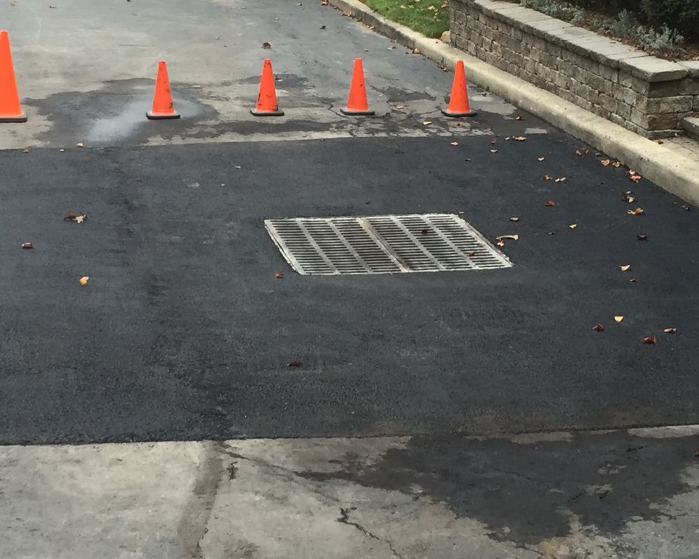 Asphalt Repair with Drainage Grate