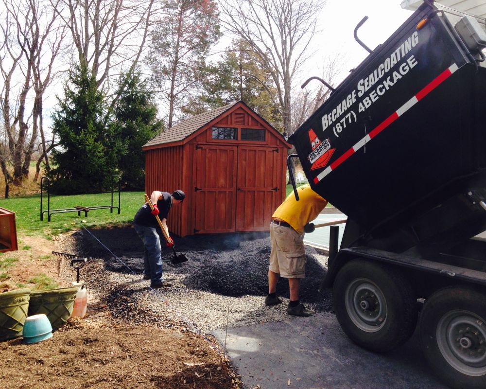 Pouring Asphalt for Driveway Expansion